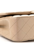 Iridescent Caviar Quilted Medium Double Flap Dark Beige