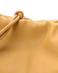 Mellow Nappa Donut Chain Large Flamenco Knot Clutch Sahara