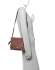 X SUNA FUJITA Nappa Flamenco Knot Clutch Havana