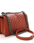 Metallic Caviar Chevron Quilted Medium Boy Flap Orange
