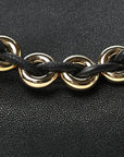 Mellow Nappa Medium Donut Chain Flamenco Knot Clutch Black