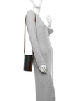 Triomphe Canvas Vertical Cylinder Bag Tan