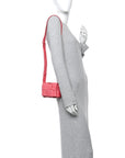 Rubber Maxi Intrecciato Extra Mini Cassette Crossbody Bag Firework