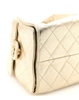 Metallic Caviar Quilted Small CHNL 25 Handbag Gold