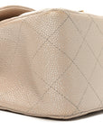 Iridescent Caviar Quilted Jumbo Double Flap Beige