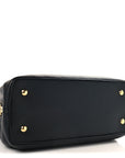 Taurillon Capucines GM Souple Black