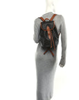 Triomphe Canvas Calfskin Folco Backpack Tan