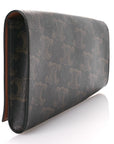 Triomphe Canvas Asymmetric Clutch Tan
