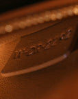Triomphe Canvas Asymmetric Clutch Tan