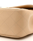 Caviar Quilted Jumbo Double Flap Light Beige