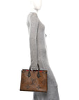 Reverse Monogram Giant Onthego MM