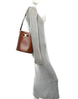 Satinated Calfskin Maillon Triomphe Bucket Bag Tan