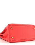 Togo Kelly Retourne 28 Rouge Pivoine