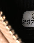 Caviar Quilted Round Filigree Crossbody Beige Black