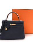 Togo Horseshoe Au Galop Kelly Retourne 28 Bleu Nuit Rouge H Fauve