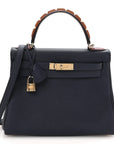 Togo Horseshoe Au Galop Kelly Retourne 28 Bleu Nuit Rouge H Fauve