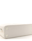 Taurillon Capucines East West MM Optic White