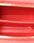 Caviar Quilted Small CC Filigree Vanity Case Red
