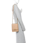 Caviar Quilted North South Boy Flap Beige