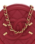 Caviar Quilted Round Filigree Crossbody Red