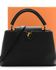 Taurillon Capucines MM Black Fuchsia