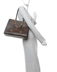 Reverse Monogram Giant Onthego MM