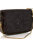 Vernis Monogram Mini Pochette Accessories Amarante
