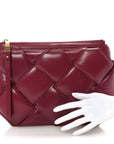 Paper Calfskin Maxi Intrecciato Padded Pouch Clutch Amaranto